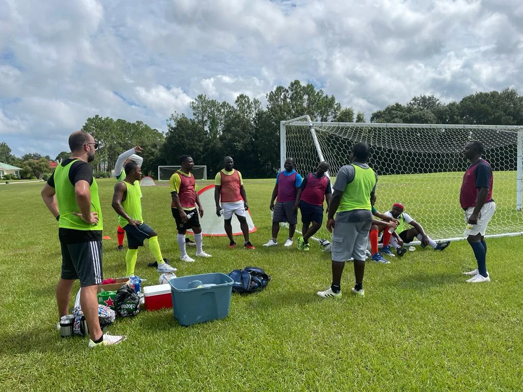 Players gathering for football practice