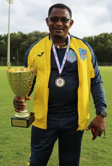Head Coach Mr. Njeck Atagwe